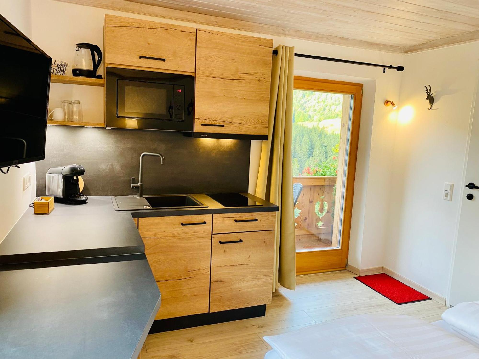 Alm Seasons Premium Chalet & Studios Saalbach-Hinterglemm Quarto foto